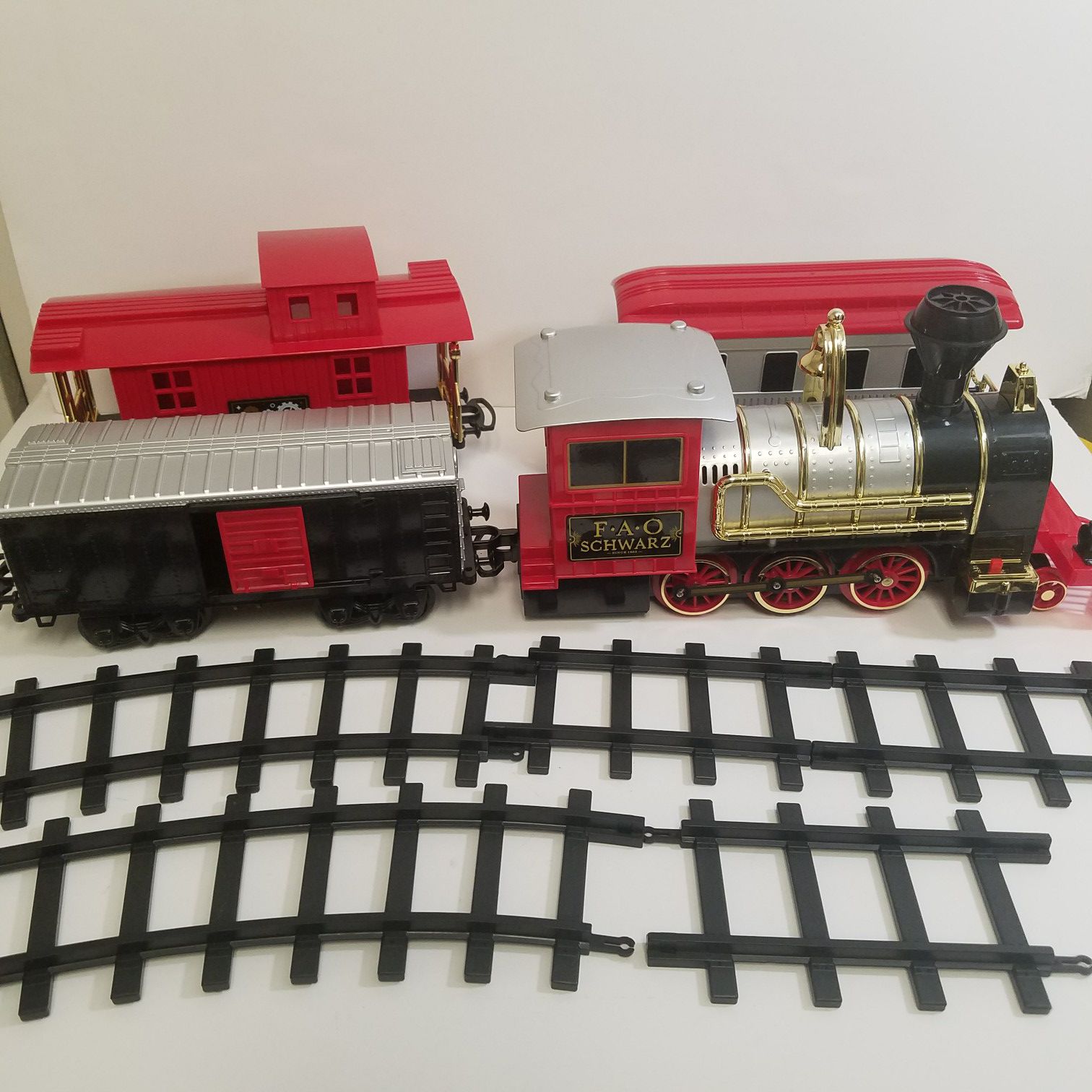 FAO Schwarz red train set with tracks