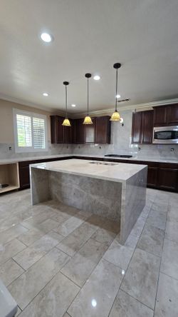Taj Mahal Countertop Installation & Slab Fabrication