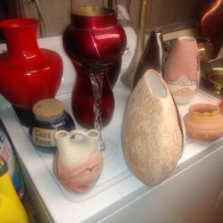 Pottery, Blown Glass, Wooden Vases.