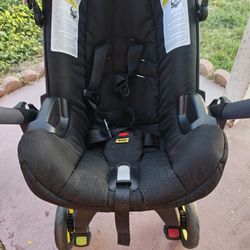 Doona Car Seat/Stroller (Pink Canopy And Original) 