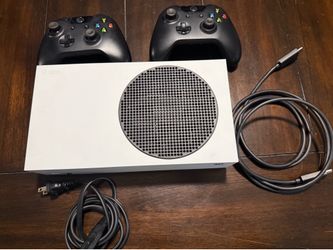 Xbox series S with two controllers.