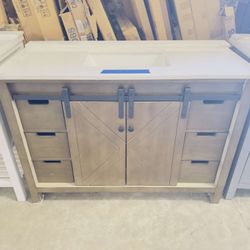 “48” Brown Bath Vanity and Marble Countertop in White  $699 