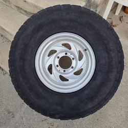          15 " SPAIRE  TIRE   AND. RIM  6 LUG