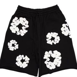 black denim tear shorts