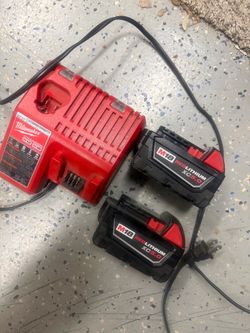 Milwaukee CHARGER and  batteries