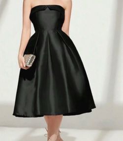 Strapless Black satin mini skirt with pleats