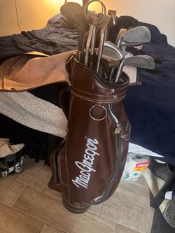 Leather Macgreggor bag with golf clubs