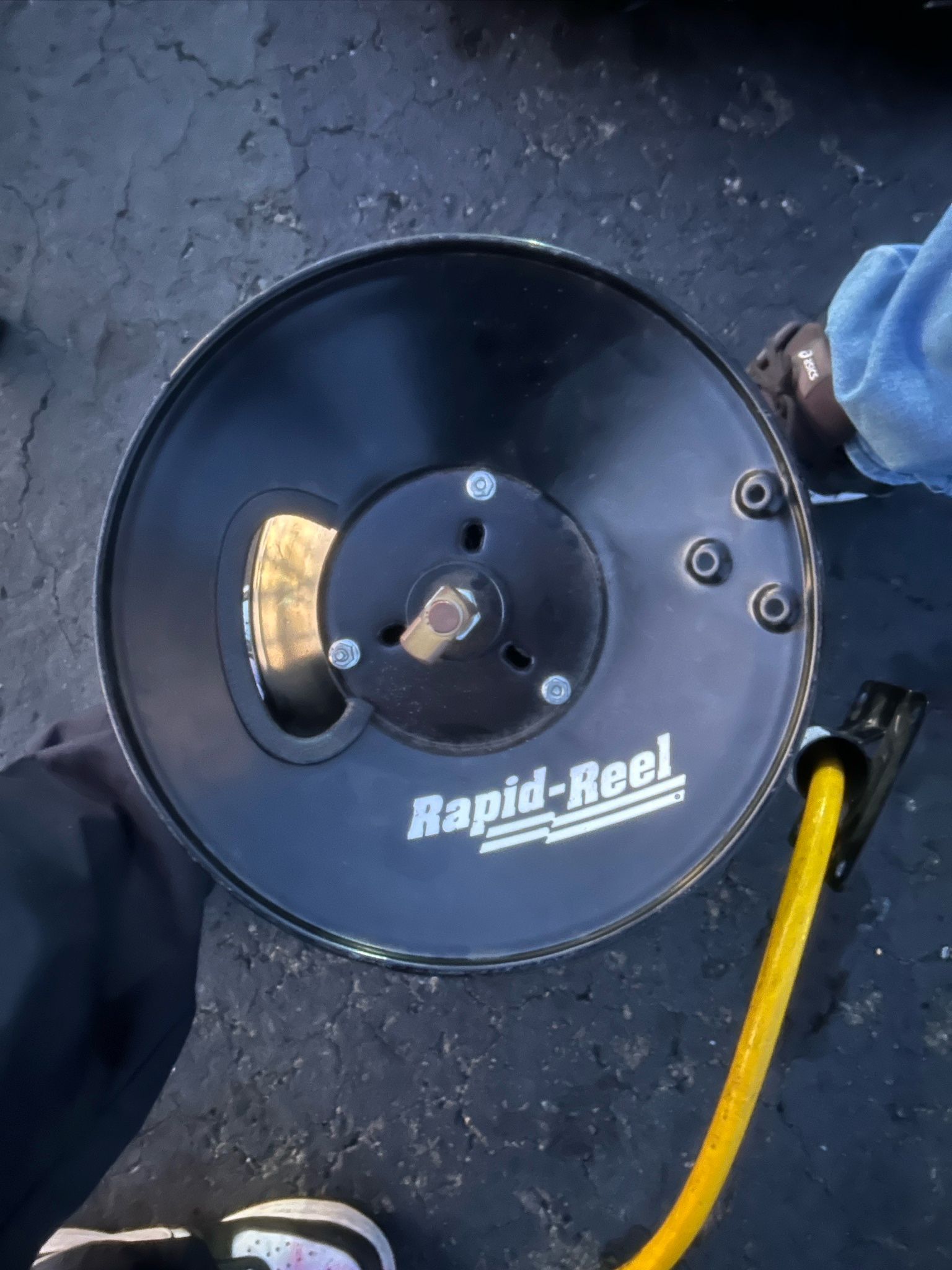 a Rapid Reel brand hose reel. Rapid Reel products are industrial and resi