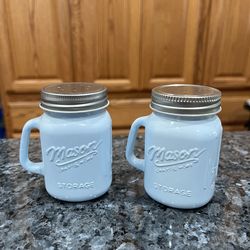 Vintage Milk Glass Mason Jar (Blue) Pair of Salt and Pepper Shakers.  Size approximately  3 1/4 inches tall.  Preowned never used.  Has been on displa