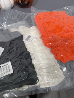 Black, orange  and white balloons