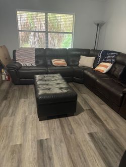 Leather sectional with table and chairs