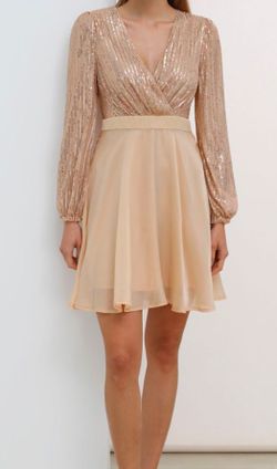 PLUNGING SPLICED SEQUINED SKATER DRESS IN APRICOT