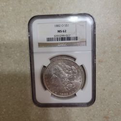 1882 O  Morgan Silver Dollar . Graded 