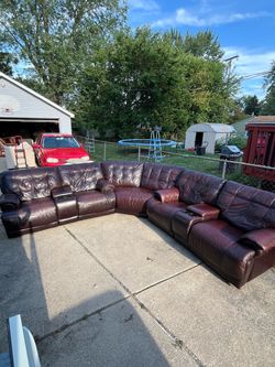 Chateau d’Ax Leather Reclining Sectional w/ Cup Holders – Delivery Available