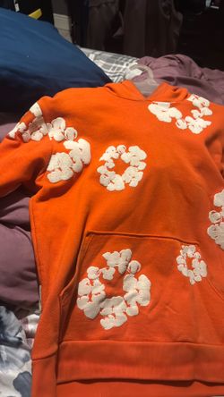 Orange denim tear