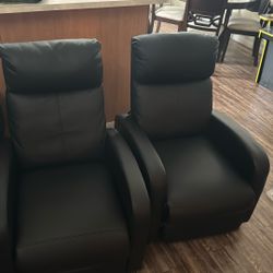Two Black Recliners With Lower Back Massager 