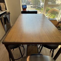 counter-height dining table set with built-in glass rack and storage shelf