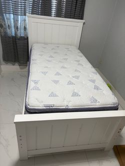 Twin bed with mattress