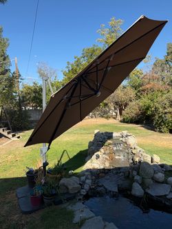Umbrella with light and base