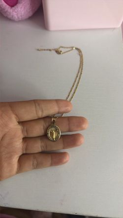 real gold chain( has name nathalie in the back can be removed)