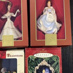 3 Princess Ornaments Still In The Boxes And 1 Santa In The Box.
