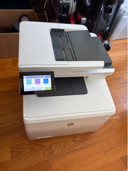 Like New HP Color Laser Jet Enterprise M480 All-in-One Wireless Bluetooth Network Printer  Dimensions (W X D X H) 16.4 x 18.6 x 15.7 in  Weight: 51 LB