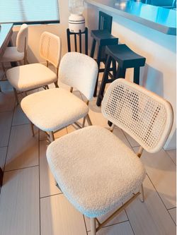 4 pretty cane dining chairs