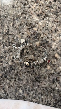 Silver pandora bracelet with charms