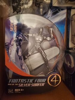 Brand new silver surfer action figurines new inbox never opened 2006