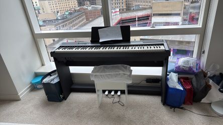 Piano with free piano stool