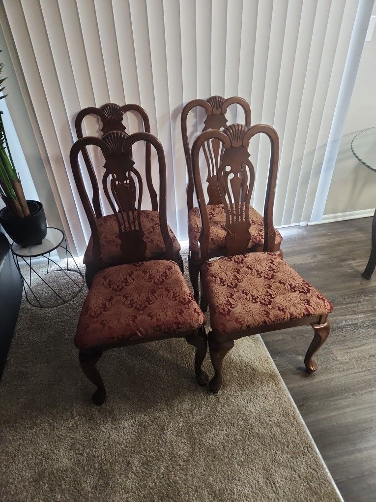 Four pristine chairs