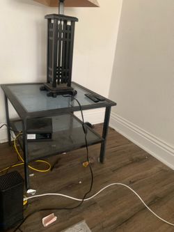 Glass corner table