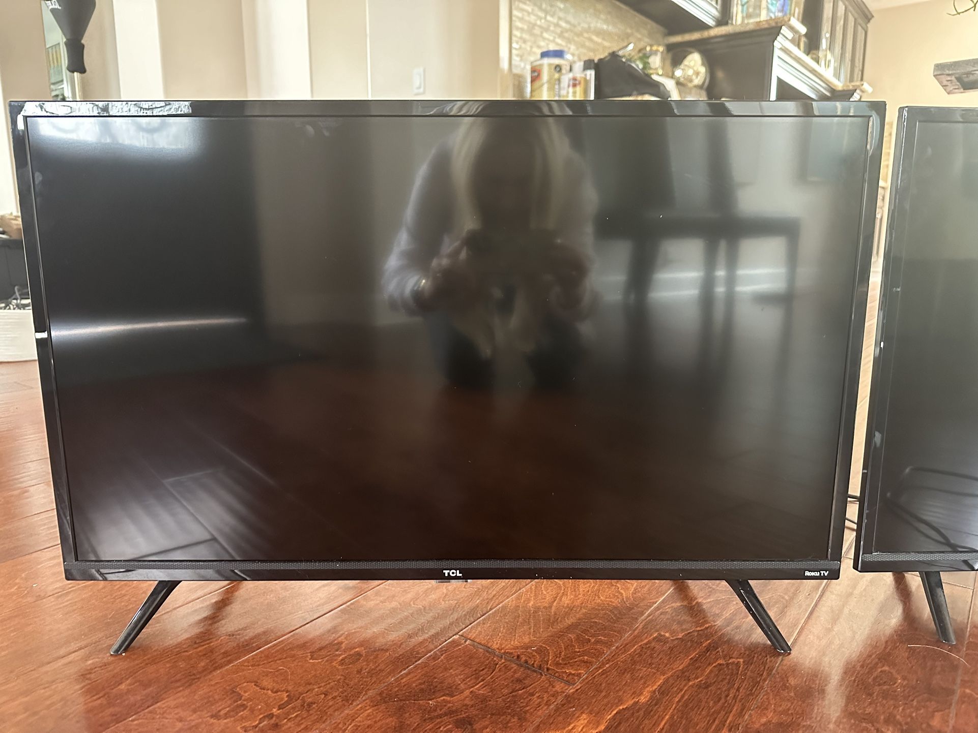 32 inch TCL Roku TV (I have two)