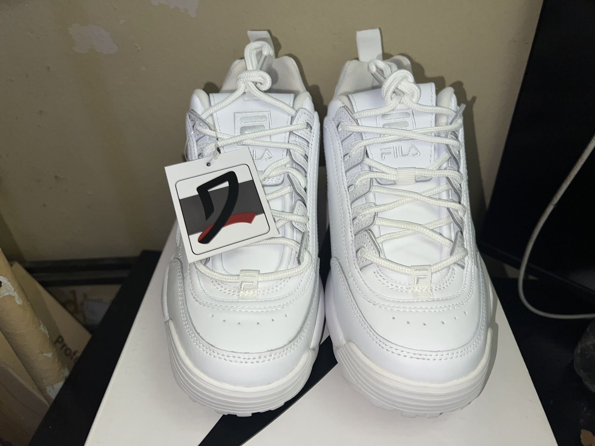 DS women’s Triple white disruptor 2 size 9w