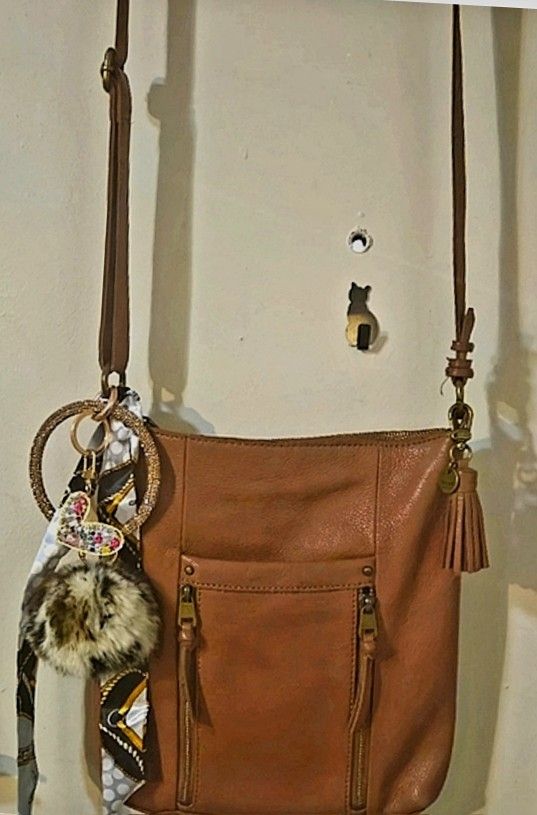 The SAK all Leather Comes With Wristlet Keyring And Purse Scarf