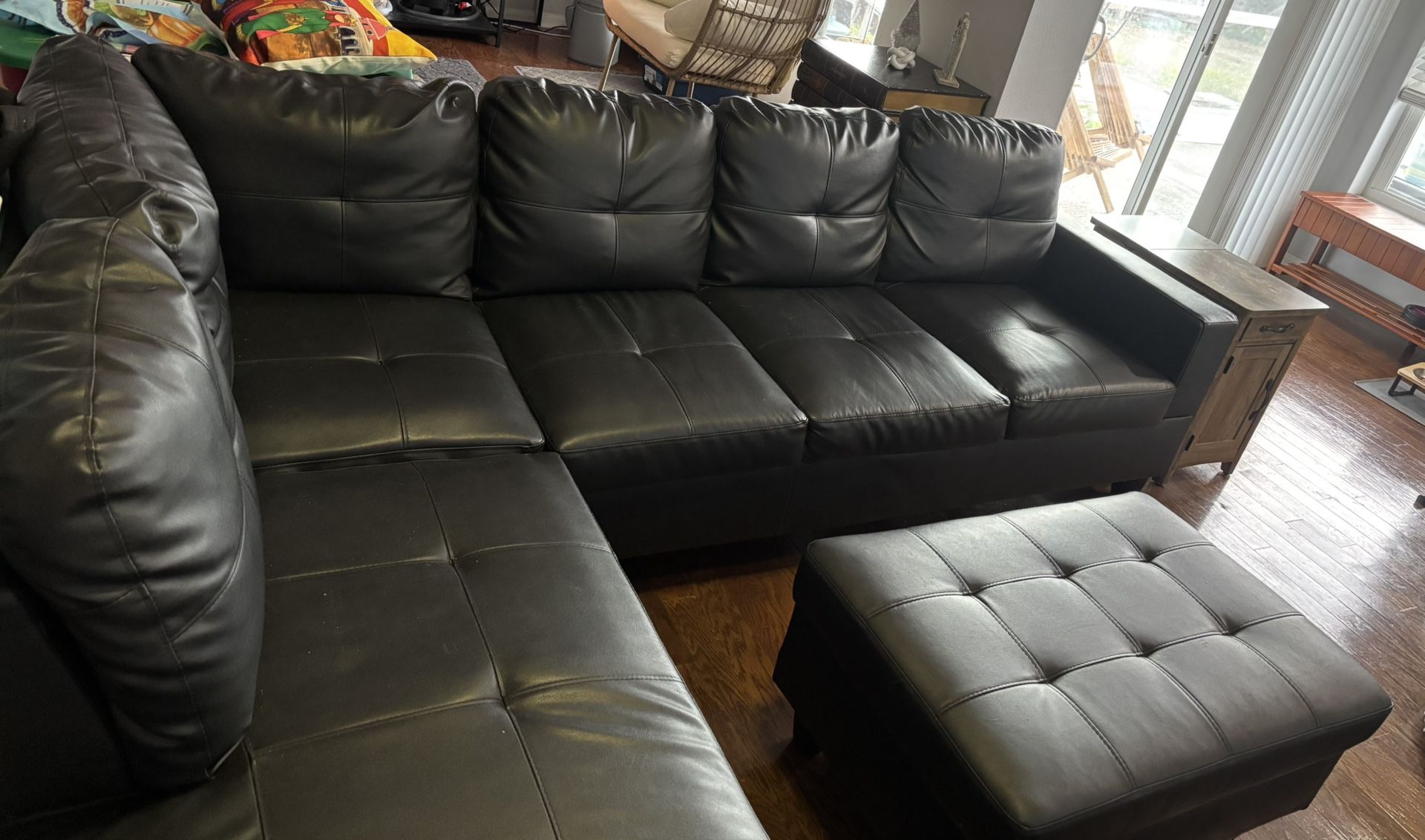 Wilhelmine 103.5” Black Wide Faux Leather Sofa & Chaise