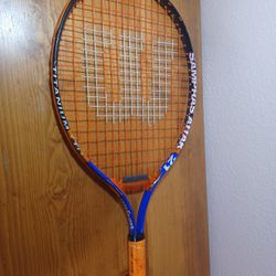 4 Tennis Racquets (Mostly Wilson)