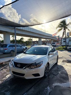 Nissan Altima White Sedan