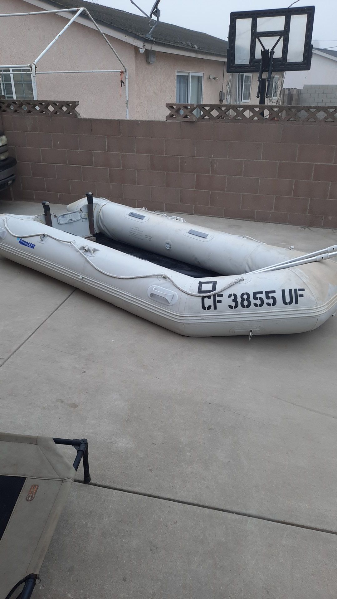 Photo Inflatable boat 15hp out board and trailer