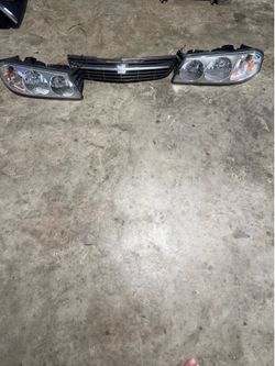 Chevy impala headlights and grill