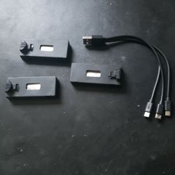THREE BRAND NEW DRONE BATTERIES AND CHARGER CABLE