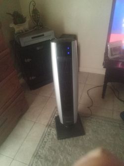 Stand up fan blows pretty good comes with the remote but I can't get it to work come off the back to clean filter