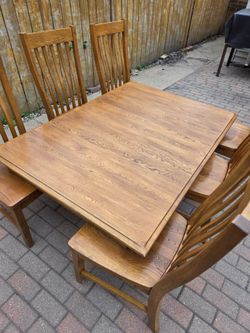 Solid wood dining table with 6 chairs