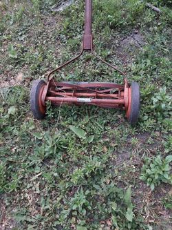 Manual lawn mover .