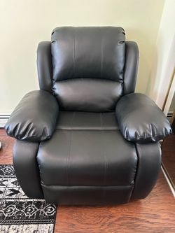 Recliner for sale (black faux leather)