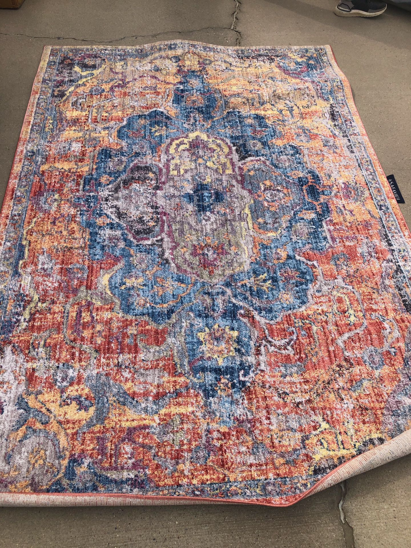Brand new colorful area rug. Retails for over $220