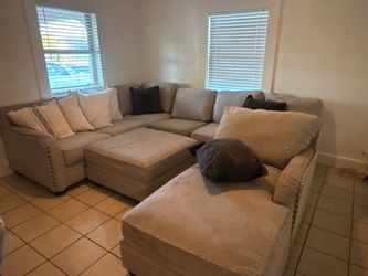 Beautiful. Middle studed Gray sectional.