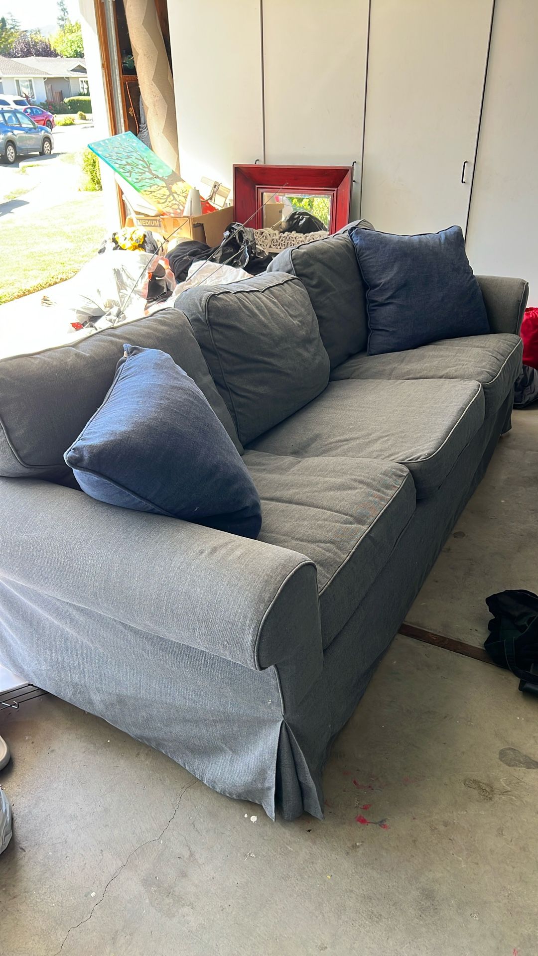 Blue Sofa W Extra Pillows