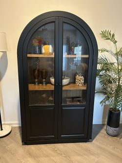 Dagandale Black Arched Glass Door Cabinet (Ashley Furniture) — $550 FIRM