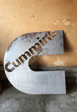 Cummins C metal sign